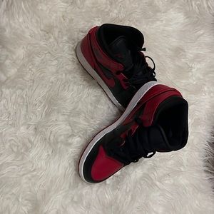 Red a black Jordan Ones